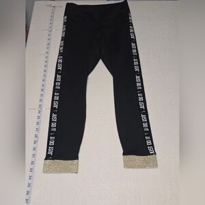 Nike Black Pants with Gold Accents